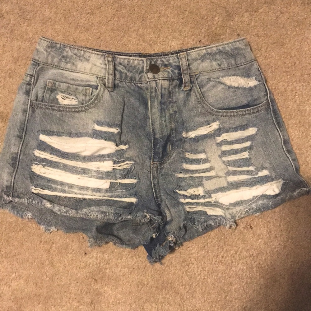distressed light wash high-rise denim shorts